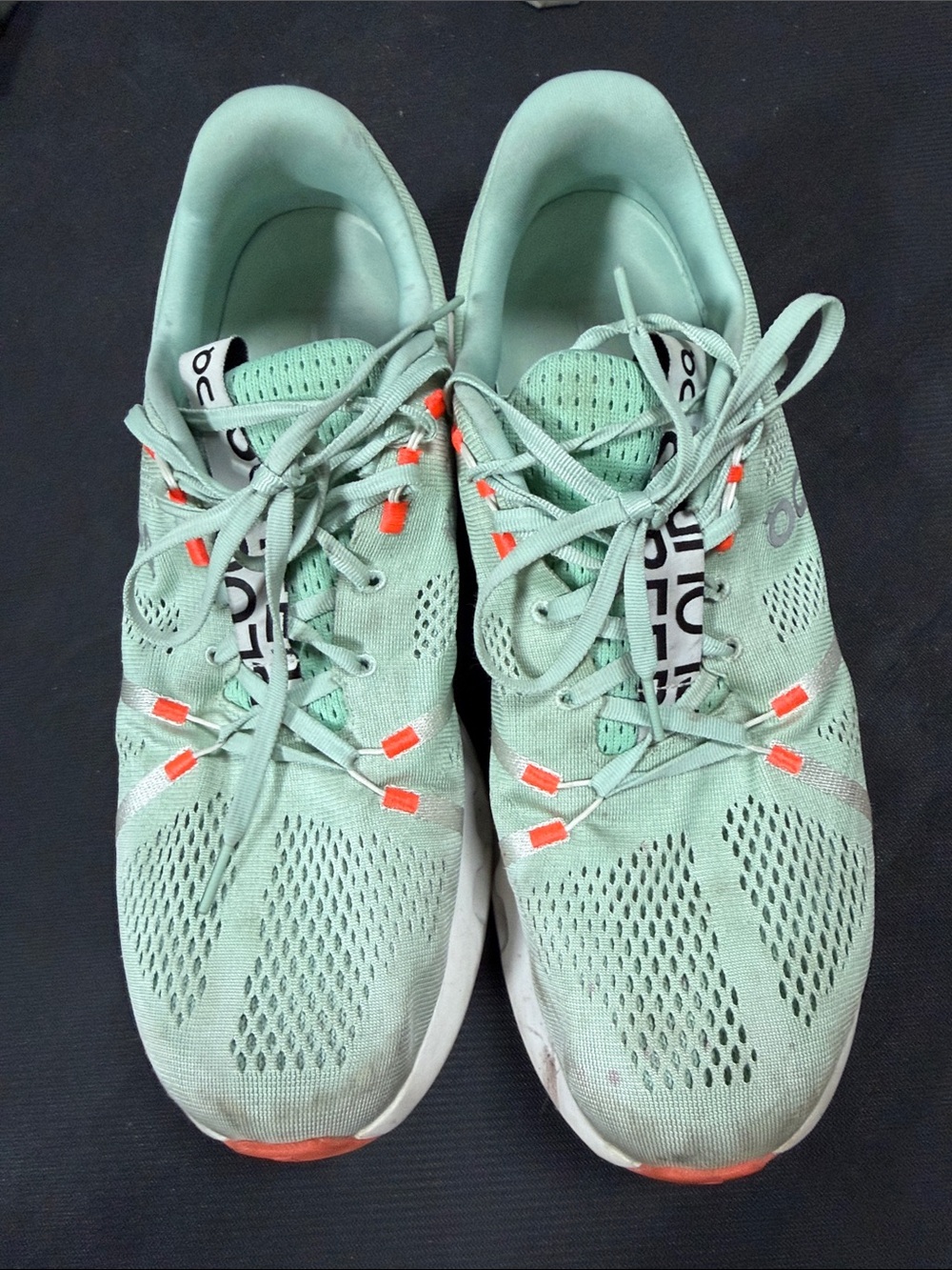 On Running Mint Green Athletic Sneakers with Orange Accents